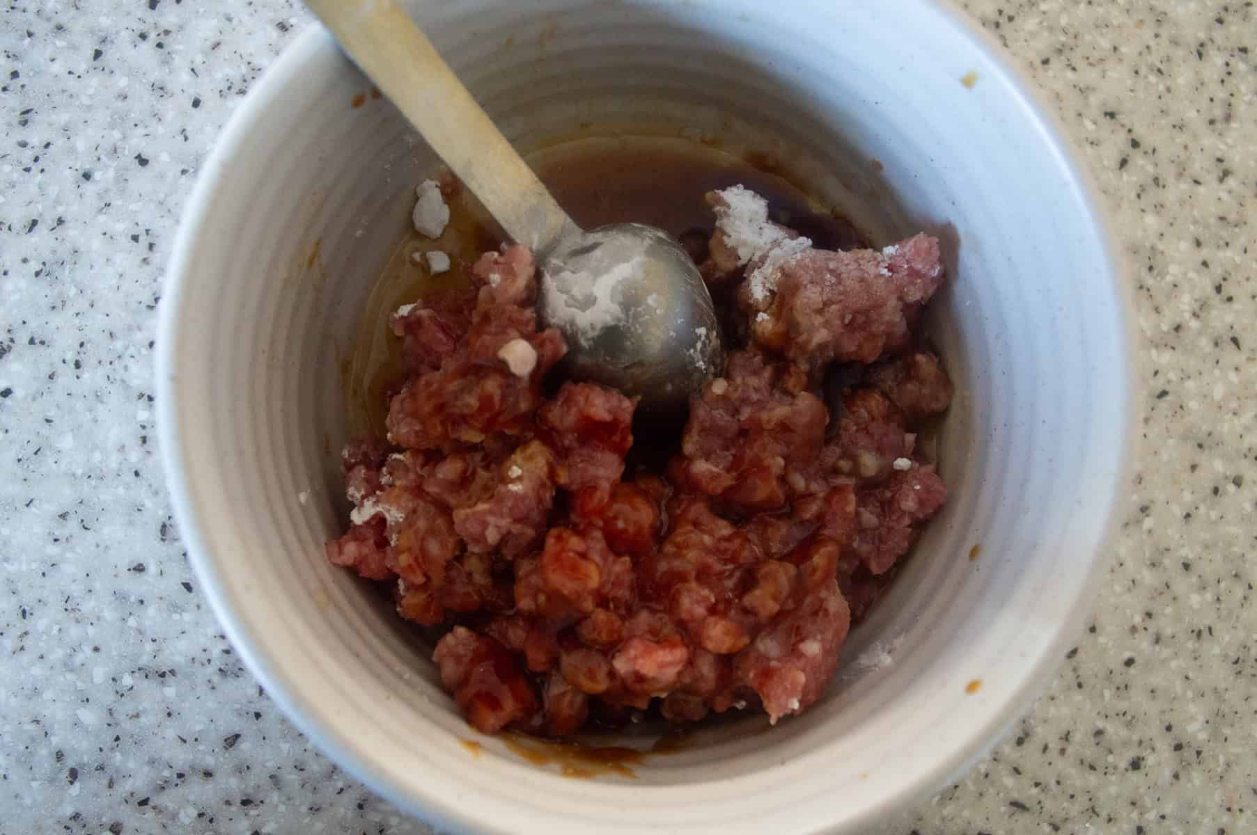 Beef seasoned in cornstarch, soy, oyster sauce and sugar for savory asian oatmeal 